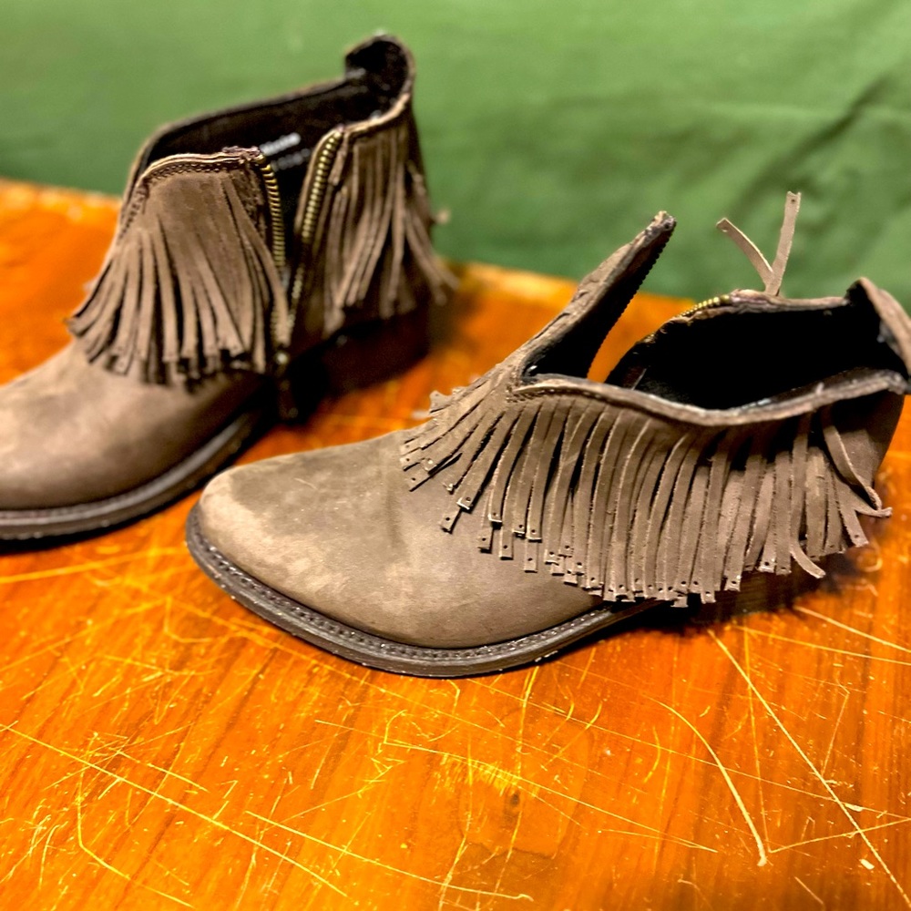 Ariat fringe western booties.